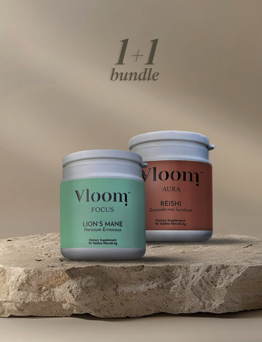 Two Vloom product jars on a stone surface with a beige background
Lion's Mane, Reishi